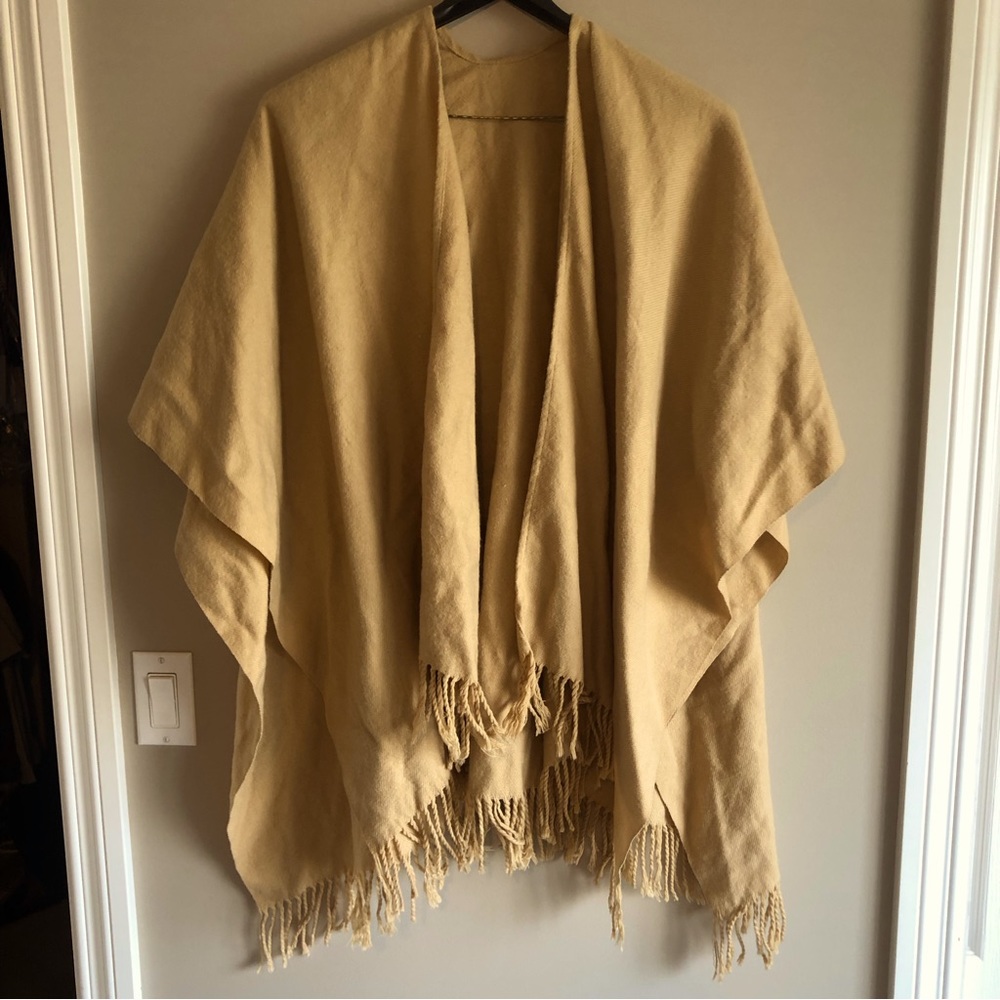 Beautiful lite brown fringed wrap/shawl cover perfect for those fall days/nights